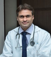 Dr. Anuj Sathe